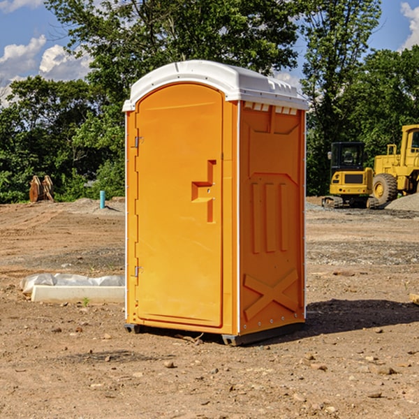 what is the cost difference between standard and deluxe portable restroom rentals in Emlyn